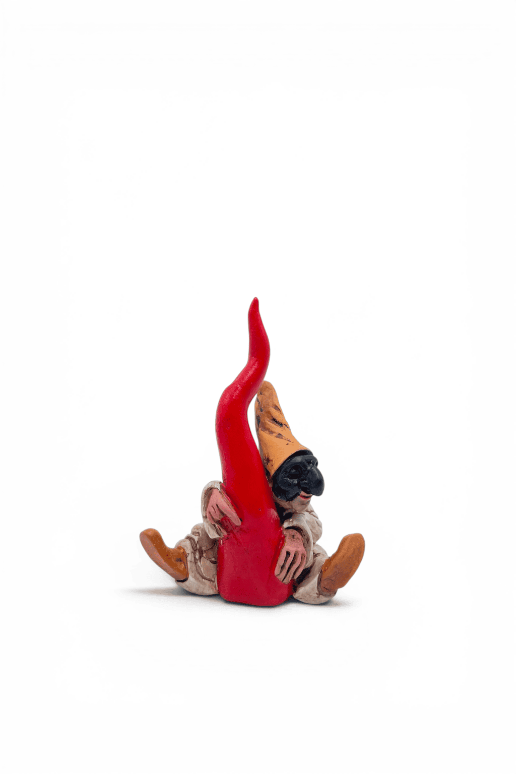 Pulcinella sitting hugging the horn