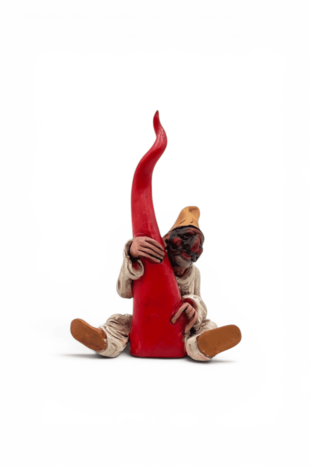 Pulcinella sitting hugging the horn